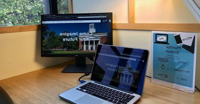 Laptops always can always find a study spot and a large monitor in the library.